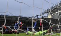 West Bromwich Albion's goalkeeper Boaz Myhill reacts after Chelsea's Samuel Eto'o (L) scored during their English Premier League soccer match at Stamford Bridge in London November 9, 2013.