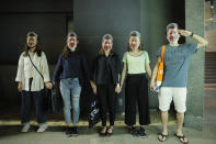 Protesters wear masks of Chinese President Xi Jinping in Hong Kong, Friday, Oct. 18, 2019. Hong Kong pro-democracy protesters are donning cartoon/superhero masks as they formed a human chain across the semiautonomous Chinese city, in defiance of a government ban on face coverings. (AP Photo/Kin Cheung)