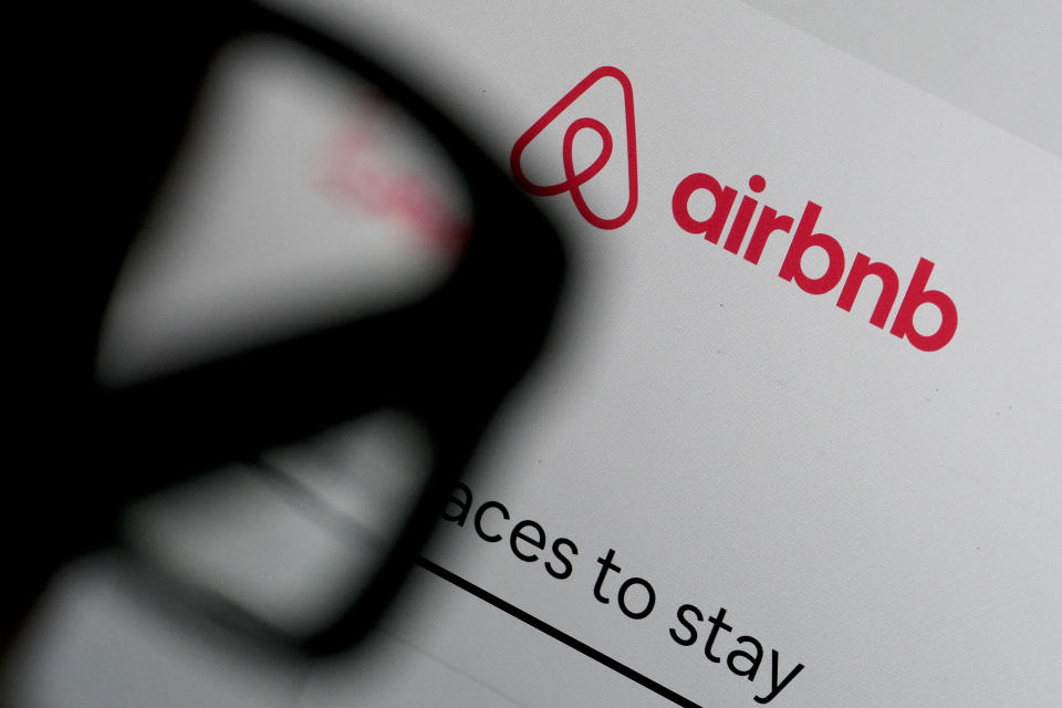 KATWIJK, NETHERLANDS - APRIL 20: In this photo illustration, a man looks at the website of Airbnb on April 20, 2020 in Katwijk, Netherlands.  (Photo by Yuriko Nakao/Getty Images)