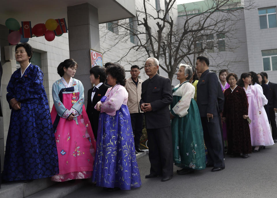 People line up to vote during the election at a polling station in Pyongyang, North Korea, Sunday, March 10, 2019. Millions of North Korean voters, including leader Kim Jong Un, are going to the polls to elect roughly 700 members to the national legislature. In typical North Korean style, voters are presented with just one state-sanctioned candidate per district and they cast ballots to show their approval or, very rarely, disapproval. (AP Photo/Dita Alangkara)