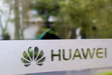 The logo of Huawei is pictured inside the Ox Horn campus at Songshan Lake in Dongguan, Guangdong province, China March 25, 2019. REUTERS/Tyrone Siu