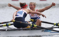 Britain's Katherine Copeland and Sophie Hosking celebrate winning the women's lightweight double sculls final of the rowing event during the London 2012 Olympic Games at Eton Dorney August 4, 2012. REUTERS/Jim Young (BRITAIN - Tags: OLYMPICS SPORT ROWING) 