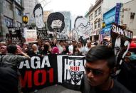 Student activists march towards Dataran Merdeka, or Independence Square, to call for the arrest of "Malaysian Official 1" in Kuala Lumpur, Malaysia August 27, 2016. REUTERS/Edgar Su