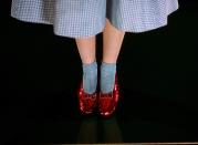 <p>Dorothy’s slippers were <a href="https://www.nytimes.com/2018/09/04/us/dorothys-ruby-slippers-stolen.html" rel="nofollow noopener" target="_blank" data-ylk="slk:originally silver;elm:context_link;itc:0;sec:content-canvas" class="link ">originally silver</a>. At least, that is how novelist L. Frank Baum wrote them in his 1900 fantasy, <em><a href="https://www.amazon.com/Wonderful-Wizard-Oz-Frank-Baums/dp/1423171268?tag=syn-yahoo-20&ascsubtag=%5Bartid%7C10063.g.34074044%5Bsrc%7Cyahoo-us" rel="nofollow noopener" target="_blank" data-ylk="slk:The Wonderful Wizard of Oz;elm:context_link;itc:0;sec:content-canvas" class="link ">The Wonderful Wizard of Oz</a></em>. Film producers favored a glittering bright red, however, for that Technicolor wow.</p>