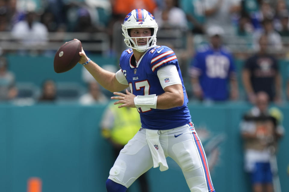 Buffalo Bills quarterback Josh Allen (17) aims a pass during the first half of an NFL football game against the Miami Dolphins, Sunday, Sept. 25, 2022, in Miami Gardens. (AP Photo/Rebecca Blackwell)
