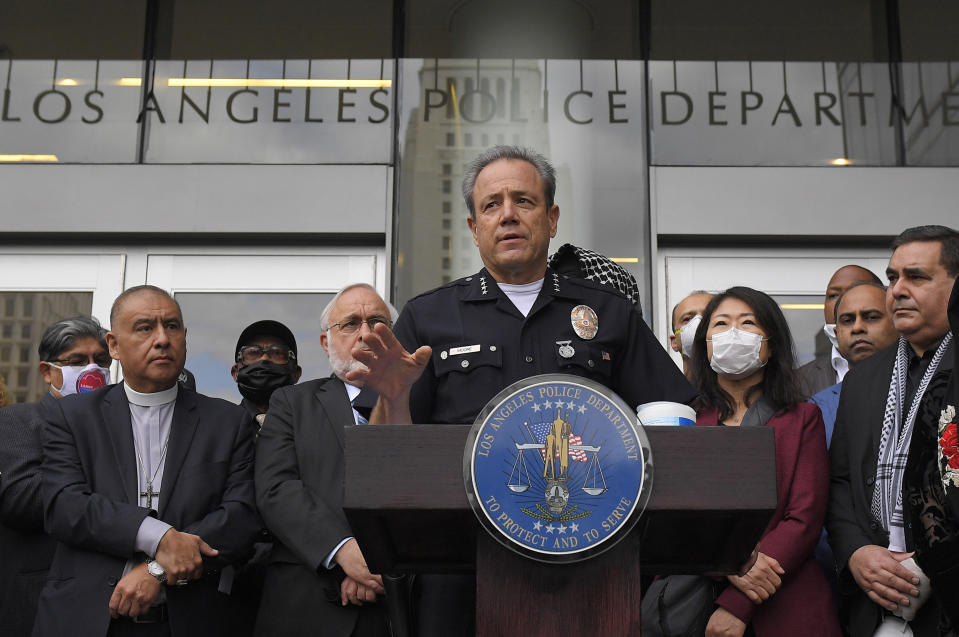 FILE - In this June 5, 2020, file photo, Los Angeles police chief Michel Moore speaks during a vigil with members of professional associations and the interfaith community at Los Angeles Police Department headquarters in Los Angeles. The LAPD launched an internal investigation after an officer reported that a photo of George Floyd with the words "You take my breath away" in a Valentine-like format was circulated among officers, according to a newspaper report. Moore said Saturday, Feb. 12, 2021, that investigators will try to determine how the image may have come into the workplace and who may have been involved, the Los Angeles Times reported. (AP Photo/Mark J. Terrill, File)