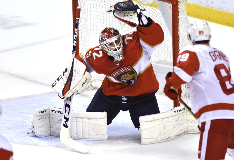 Florida Panthers goaltender Sergei Bobrovsky (72) makes a save on a shot by Detroit Red Wings center Sam Gagner (89) during the first period of an NHL hockey game Tuesday, Feb. 9, 2021, in Sunrise, Fla. (AP Photo/Jim Rassol)