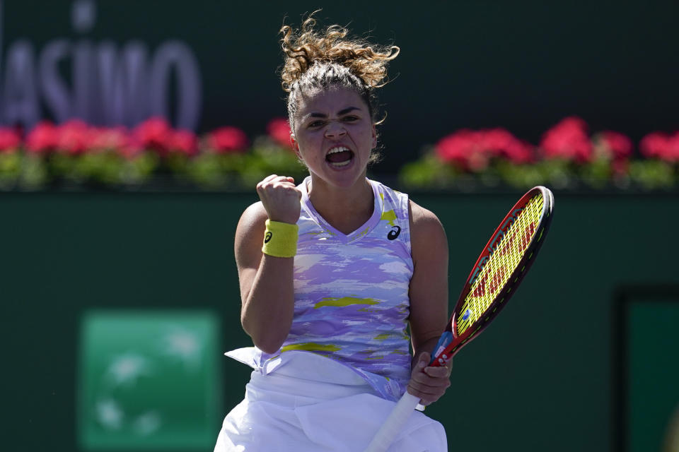 Jasmine Paolini, of Italy, reacts after a shot to Aryna Sabalenka, of Belarus, at the BNP Paribas Open tennis tournament Saturday, March 12, 2022, in Indian Wells, Calif. (AP Photo/Marcio Jose Sanchez)