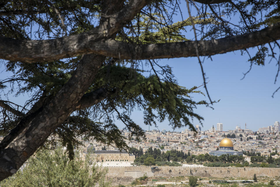 The Dome of the Rock and al-Aqsa mosque compound in Jerusalem, which remains shut to prevent the spread of coronavirus during the holy month of Ramadan, is seen from an overlook on Friday, May 1, 2020. (AP Photo/Ariel Schalit)