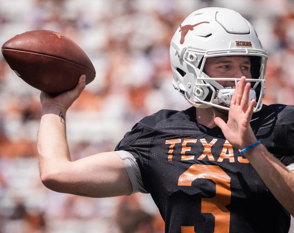Texas quarterback Quinn Ewers warms up ahead of the Longhorns' Orange and White spring game earlier this month. A good 2023 season for the Longhorns could increase Ewers' draft prospects in 2024.