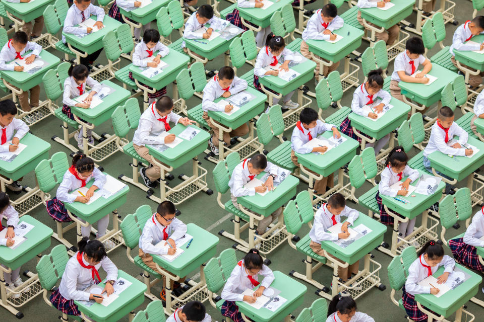 HOHHOT, CHINA - JUNE 13, 2022 - Students from Hengchang Dianxiang Primary School take part in a Chinese writing contest in Yuquan district of Hohhot, North China's Inner Mongolia Autonomous Region, June 13, 2022. (Photo credit should read CFOTO/Future Publishing via Getty Images)