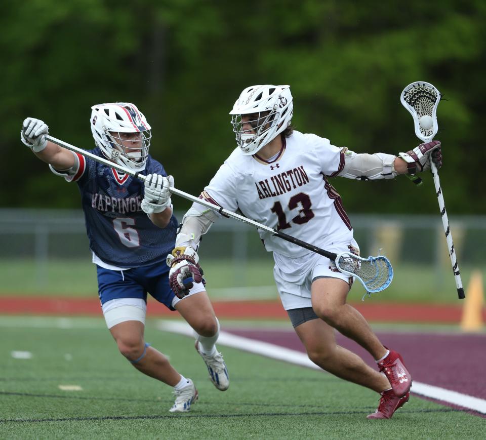 Wappingers' Caleb Clamser covers Arlington's Luke Mackin during a game on May 10, 2024.