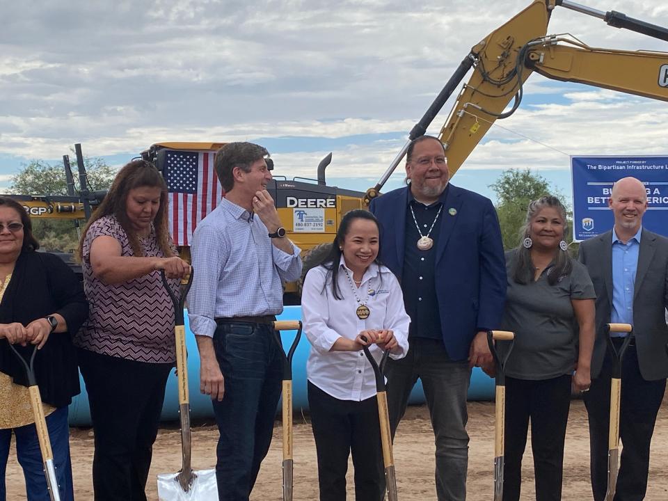 Bureau of Reclamation Commissioner Camille Calimlim Touton, center, breaks ground with Gila River Indian Community Gov. Stephen Roe Lewis, Rep. Greg Stanton and other dignitaries on a new reclaimed water pipeline project.