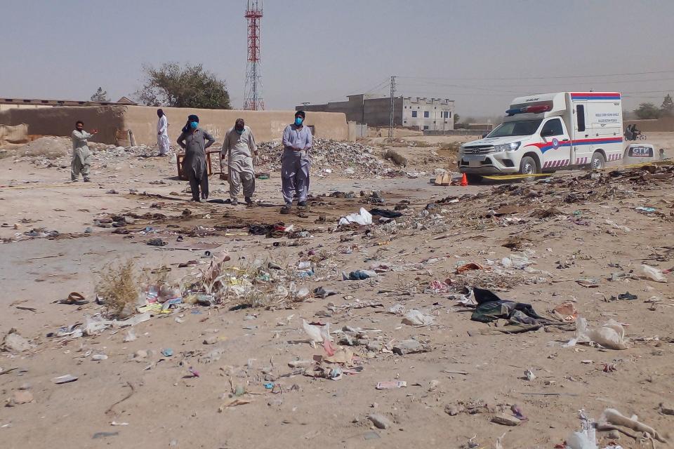 Security officials examine the site of a suicide bomb attack targeting a procession marking the birthday of Islam's Prophet Mohammed in Mastung district, Baluchistan, Pakistan, Sept. 29, 2023. / Credit: AFP via Getty