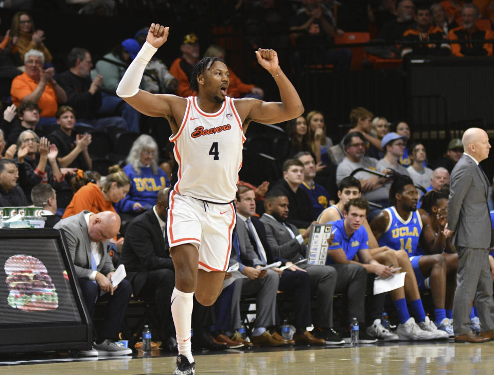 Oregon State guard Dexter Akanno (4) celebrates after one of his three first-half 3-point baskets during the first half of an NCAA college basketball game against UCLA, Thursday, Dec. 28, 2023, in Corvallis, Ore. (AP Photo/Mark Ylen)