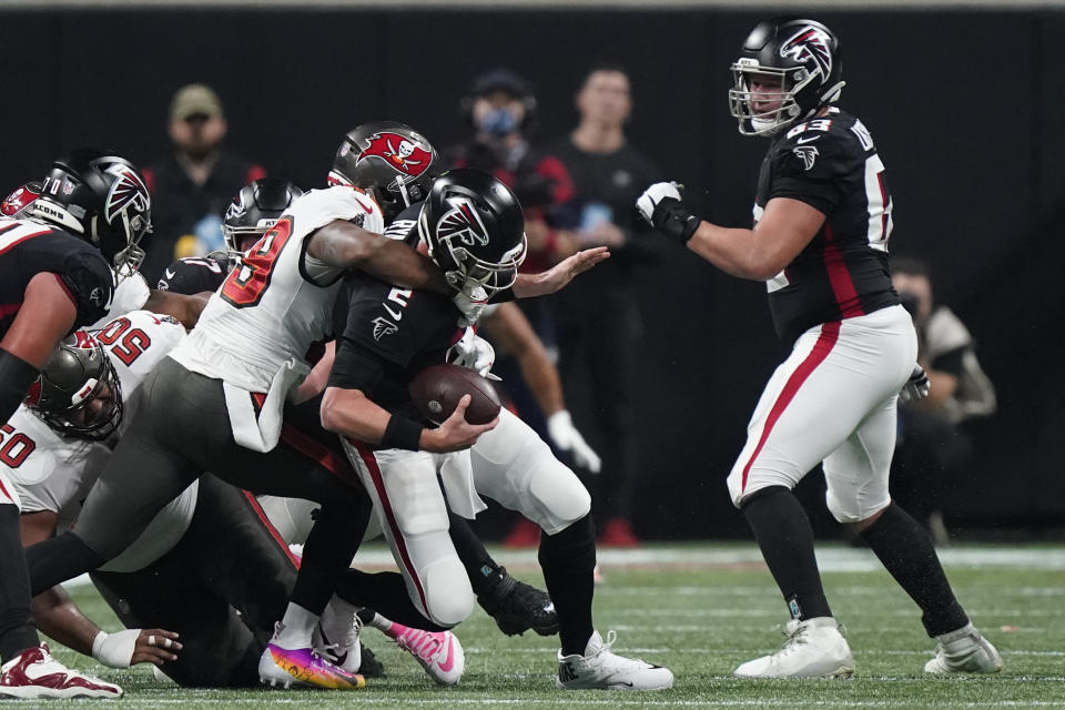 Tampa Bay Buccaneers linebacker Cam Gill (49) sacks Atlanta Falcons quarterback Matt Ryan (2) during the first half of an NFL football game, Sunday, Dec. 5, 2021, in Atlanta. (AP Photo/Brynn Anderson)