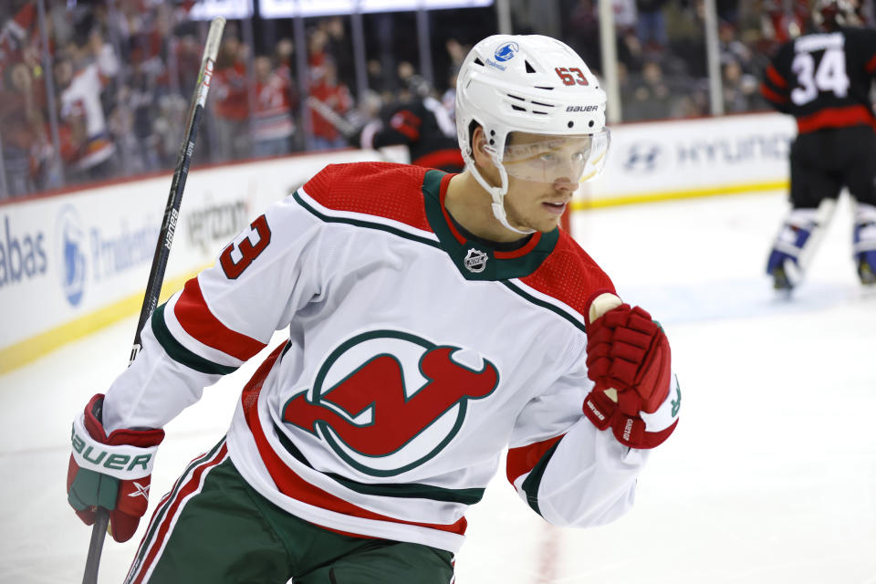 New Jersey Devils left wing Jesper Bratt (63) reacts after scoring a goal against the Ottawa Senators during the second period of an NHL hockey game, Saturday, March 25, 2023, in Newark, N.J. (AP Photo/Noah K. Murray)