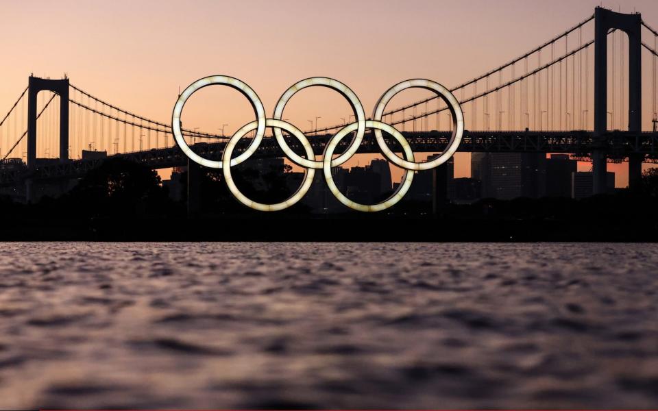Olympic rings are pictured with the Rainbow Bridge in the background. Tokyo was to host the 2020 Summer Olympic Games on July 24-August 9, 2020. The games were postponed for a year due to the COVID-19 pandemic. - Getty Images