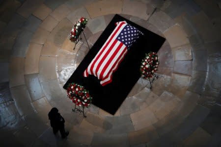 A casket with the body of late U.S. Senator McCain lies in state in the Rotunda at the U.S. Capitol in Washington, U.S., August 31, 2018. REUTERS/Eric Thayer