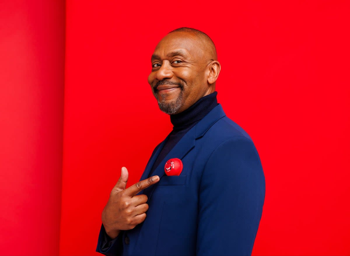 Sir Lenny Henry supports Red Nose Day 2024 by wearing one of the new Red Noses (Rebecca Naen/Comic Relief)