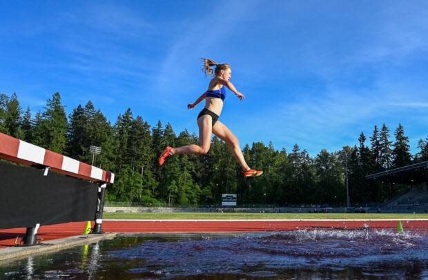 Julia Howley, who grew up in St. John's, soars over a hurdle at the Vancouver Sun Harry Jerome Track Classic on June 12. (@Everything.You.Got/Instagram - image credit)