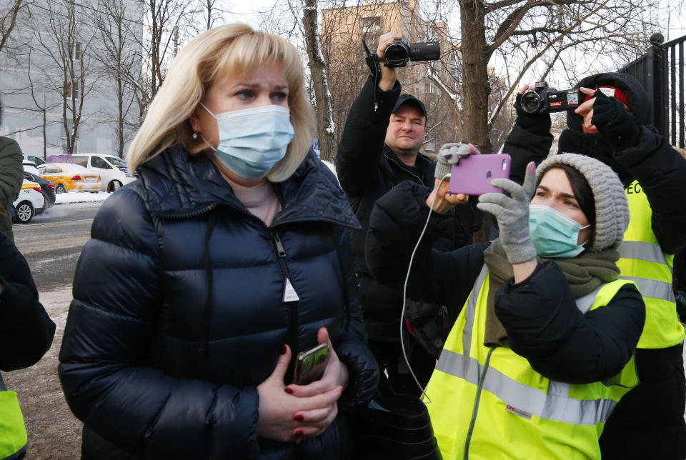 Russian opposition leader Alexey Navalny's lawyer Olga Mikhailova arrives to the Babuskinsky district court for the continuation of his trial, in Moscow, Russia, Friday, Feb. 5, 2021. A Moscow court resumes the trial against Russian opposition leader Alexey Navalny on the charges of defamation. (AP Photo/Alexander Zemlianichenko)