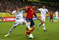 RECIFE, BRAZIL - JUNE 16: Alvaro Arbeloa of Spain holds off Martin Caceres of Uruguay during the FIFA Confederations Cup Brazil 2013 Group B match between Spain and Uruguay at the Arena Pernambuco on June 16, 2013 in Recife, Brazil. (Photo by Clive Rose/Getty Images)