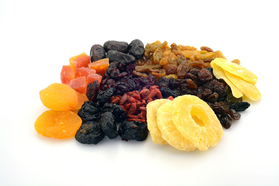 Close-Up Of Dried Fruits Over White Background