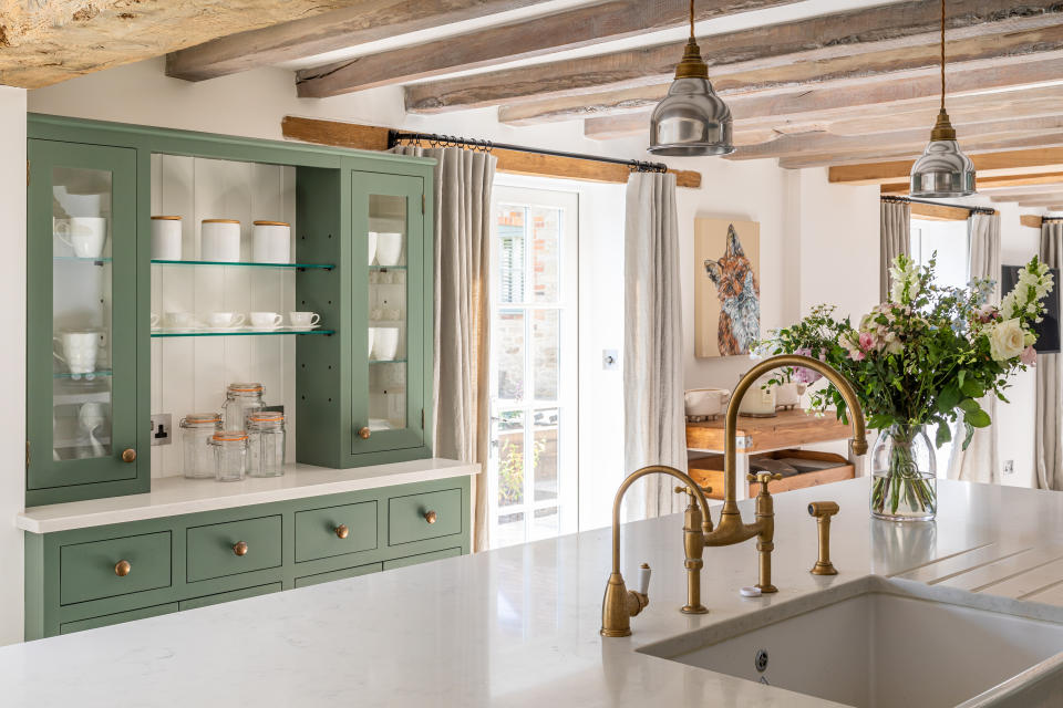 A crockery cupboard in green