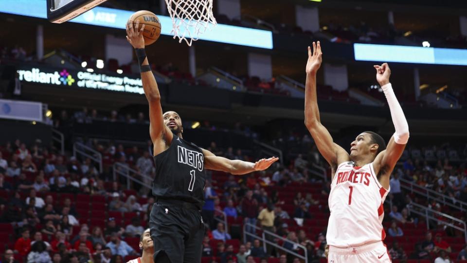 Mar 7, 2023; Houston, Texas, USA; Brooklyn Nets forward Mikal Bridges (1) shoots the ball as Houston Rockets forward Jabari Smith Jr. (1) defends during the fourth quarter at Toyota Center.