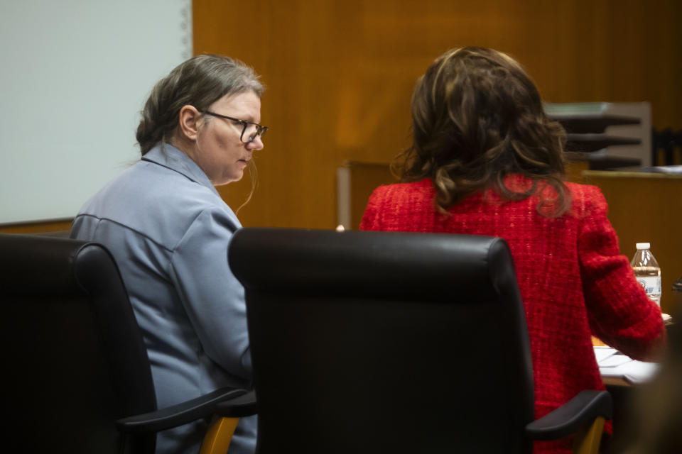 Defendant Jennifer Crumbley, left, chats with her attorney during her jury trial at the Oakland County Courthouse on Wednesday, Jan. 31, 2024, in Pontiac, Mich. Crumbley is charged with involuntary manslaughter. (Katy Kildee/Detroit News via AP, Pool)
