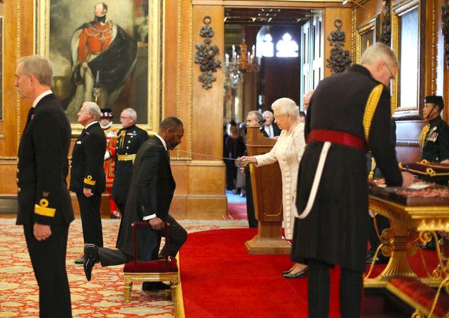 The Queen carrying out an investiture