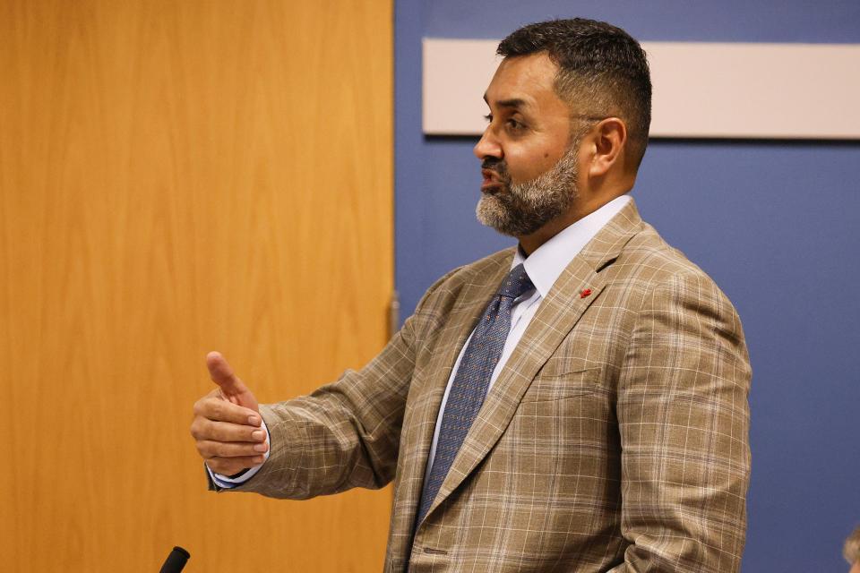 Manny Arora, attorney for Kenneth Chesebro, addresses Fulton County Superior Court Judge Scott McAfee during a motions hearing in Atlanta, Thursday, Oct. 5, 2023. Nineteen people, including former President Donald Trump, were indicted in August and accused of participating in a wide-ranging illegal scheme to overturn the results of the 2020 presidential election. (Erik S. Lesser/Pool Photo, via AP)