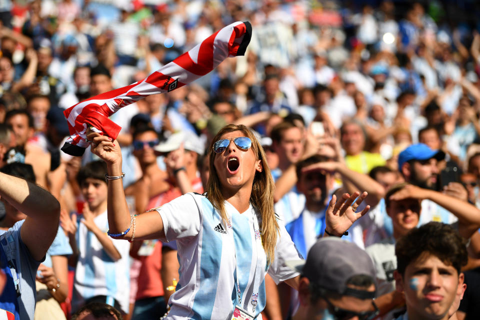 <p>In full voice: an Argentina fan inside the stadium before the match </p>