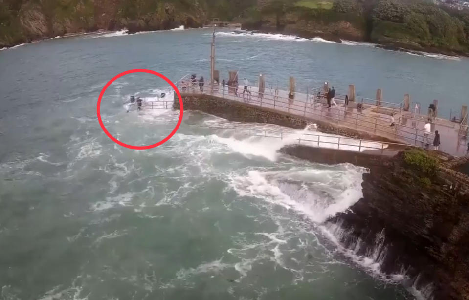 The girl was rescued from the sea by a member of the public who entered the water to grab her. (Ilfracombe Harbour Sea Rescue)