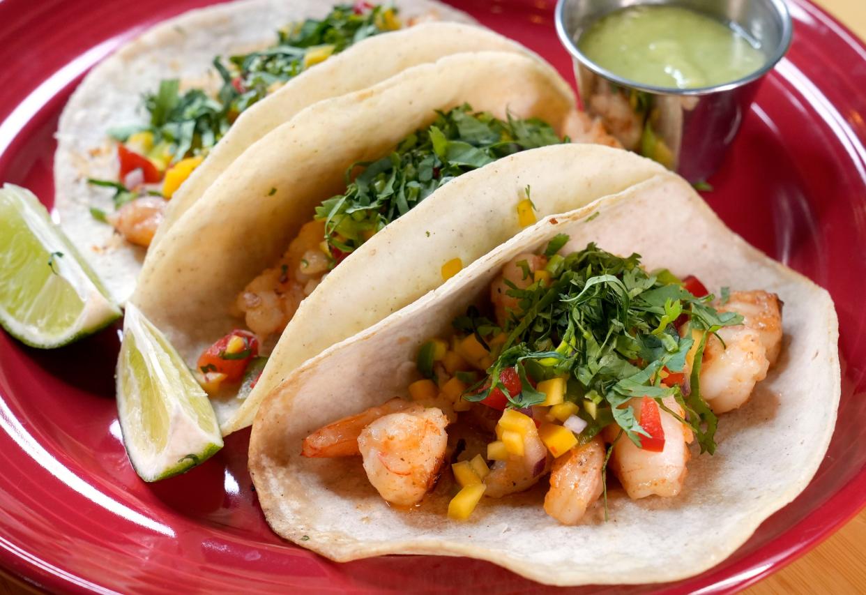 March 16, 2023; Columbus, Ohio, USA; Shrimp tacos from Dos Hermanos' Easton restaurant. Dos Hermanos is one of dozens of restaurants participating in Taco Bell and DoorDash's "Taco Tab" promotion.