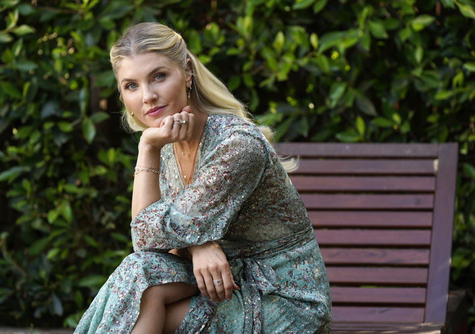 Amanda Kloots, co-host of the daytime talk show "The Talk" and co-author of the new memoir "Live Your Life: My Story of Loving and Losing Nick Cordero," poses for a portrait at home in Los Angeles on June 8, 2021. (AP Photo/Chris Pizzello)