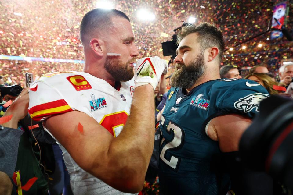 Feb 12, 2023; Glendale, Arizona, US; Kansas City Chiefs tight end Travis Kelce (87) talks with his brother Philadelphia Eagles center Jason Kelce (62) after he won Super Bowl LVII at State Farm Stadium. Mandatory Credit: Mark J. Rebilas-USA TODAY Sports