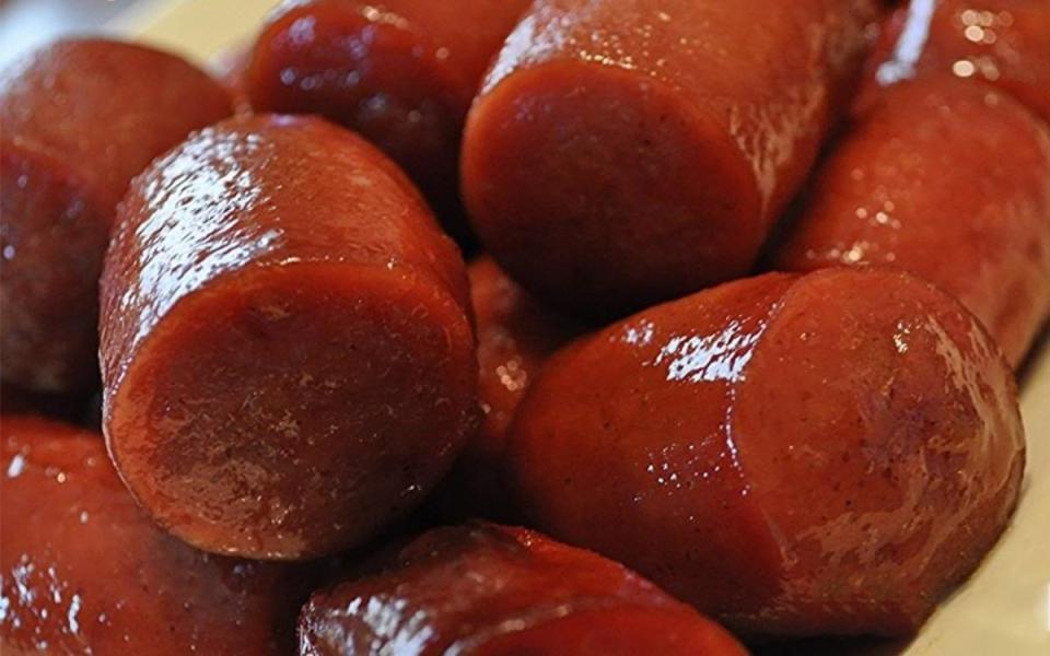 <p>Krista Marshall</p><p>This sweet and tangy app can be cut into smaller coins perfect for toothpicks.</p><p><strong>Get the recipe:<a href="https://parade.com/842552/kristamarshall/slow-cooker-glazed-kielbasa/" rel="nofollow noopener" target="_blank" data-ylk="slk:Slow Cooker Glazed Kielbasa;elm:context_link;itc:0;sec:content-canvas" class="link "> Slow Cooker Glazed Kielbasa</a></strong></p>