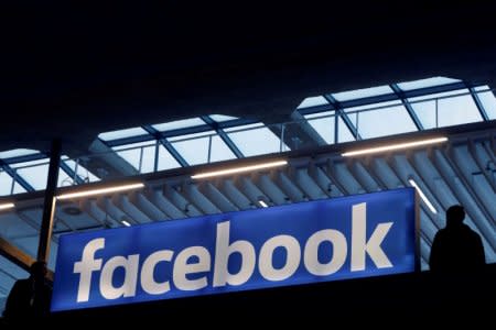 FILE PHOTO: Facebook logo is seen  at a start-up companies gathering at Paris' Station F in Paris, France on January 17, 2017. REUTERS/Philippe Wojazer/File Photo