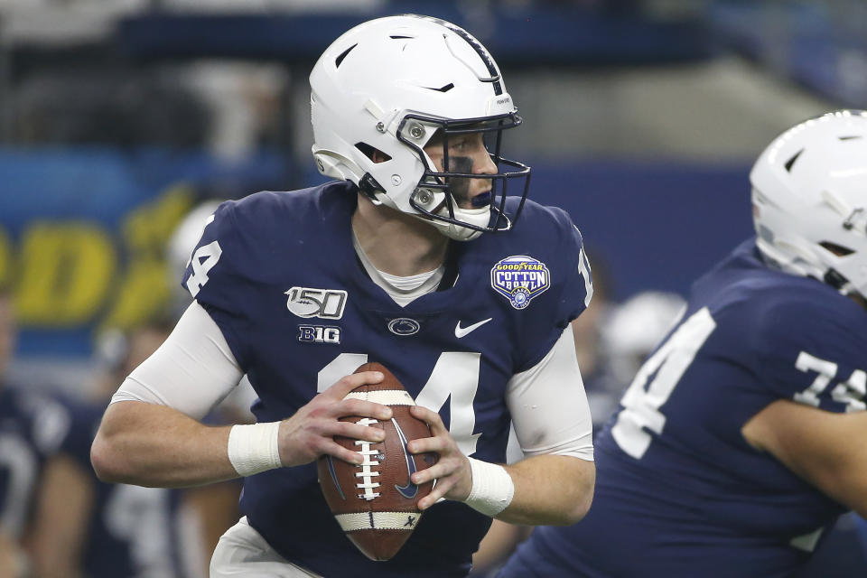 Penn State quarterback Sean Clifford (14) looks to throw against Memphis in the first half of the NCAA Cotton Bowl college football game, Saturday, Dec. 28, 2019, in Arlington, Texas. (AP Photo/Ron Jenkins)