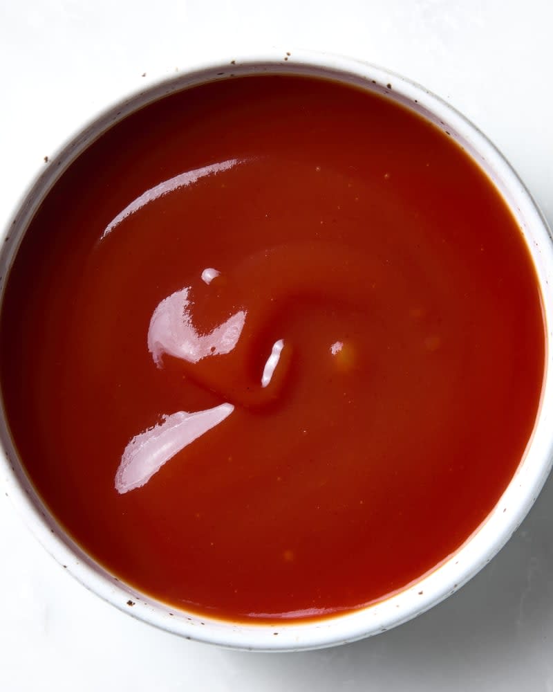 overhead shot of breakfast sauce in a small white bowl