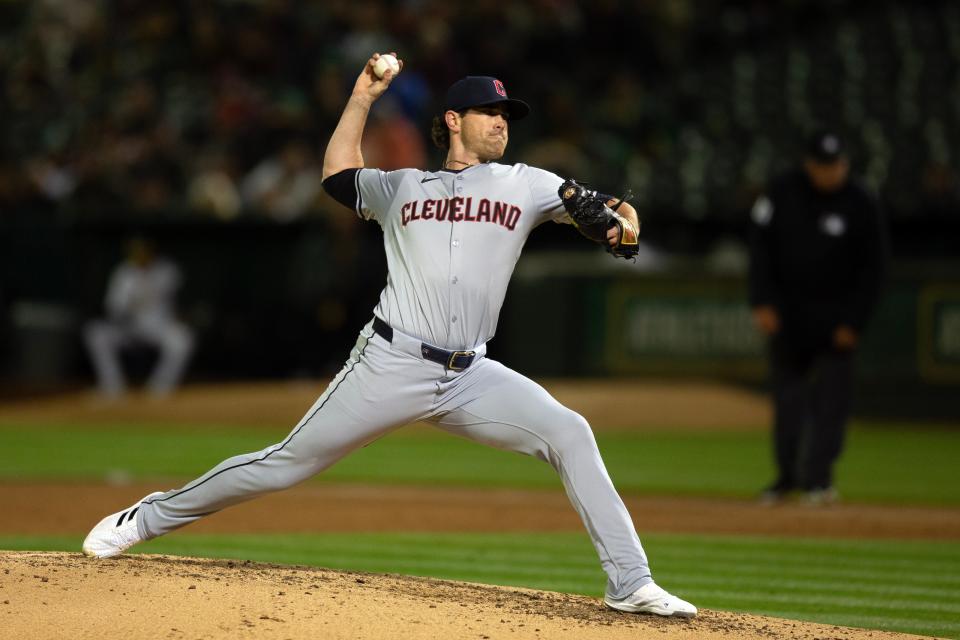 Cleveland Guardians starting pitcher Shane Bieber delivers a pitch against the Athletics Thursday in Oakland.