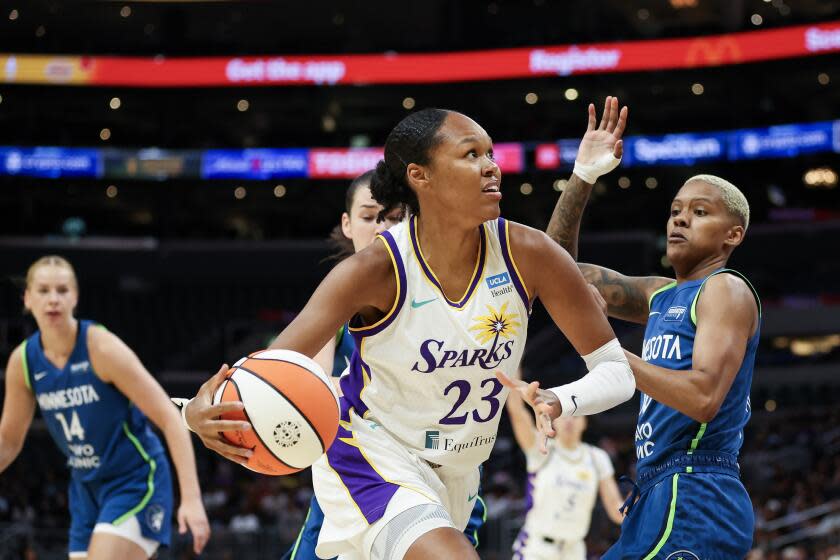 Sparks forward Azura Stevens drives toward the basket against the Minnesota Lynx