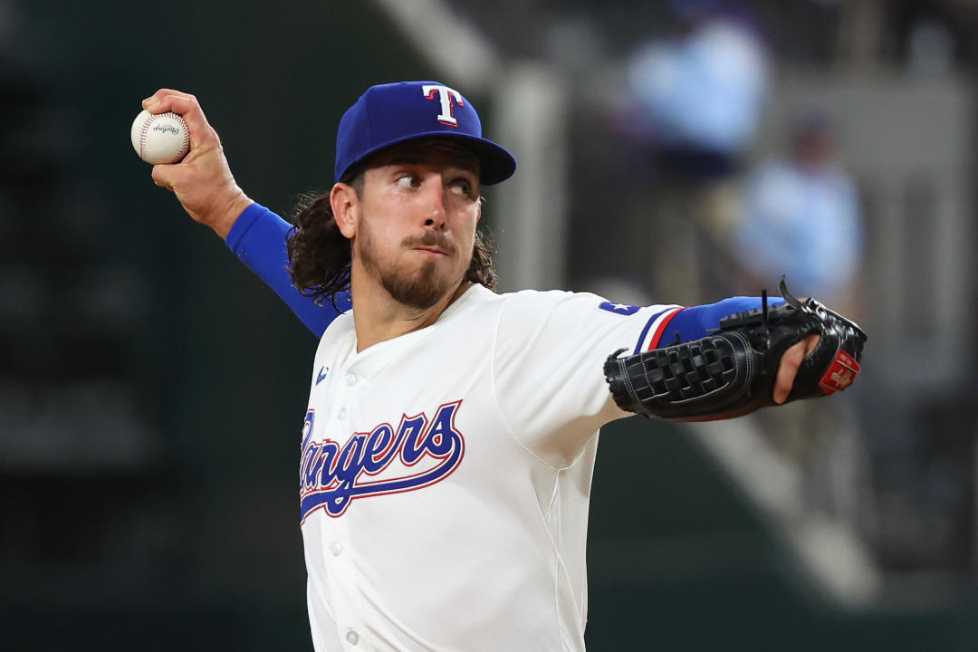 ARLINGTON, TEXAS - JULY 22: Michael Lorenzen #23 of the Texas Rangers pitches in the first inning against the Chicago White Sox at Globe Life Field on July 22, 2024 in Arlington, Texas. (Photo by Richard Rodriguez/Getty Images)