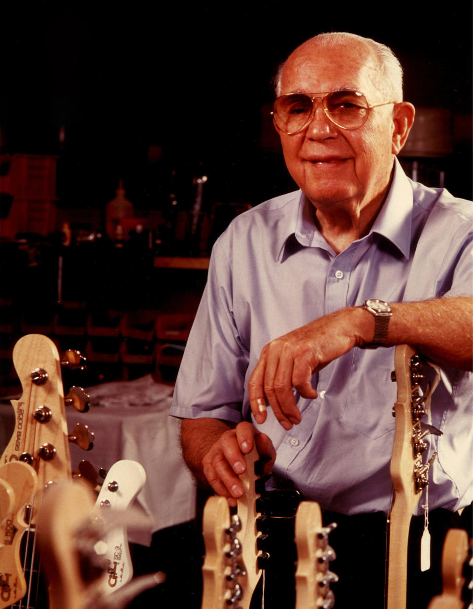 Leo Fender poses with G&L Guitars