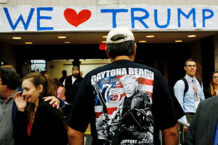 Supporters of U.S. Republican presidential candidate Donald Trump arrive to attend a campaign rally at Crosby High School, in Waterbury, Connecticut, U.S., April 23, 2016. REUTERS/Eduardo Munoz