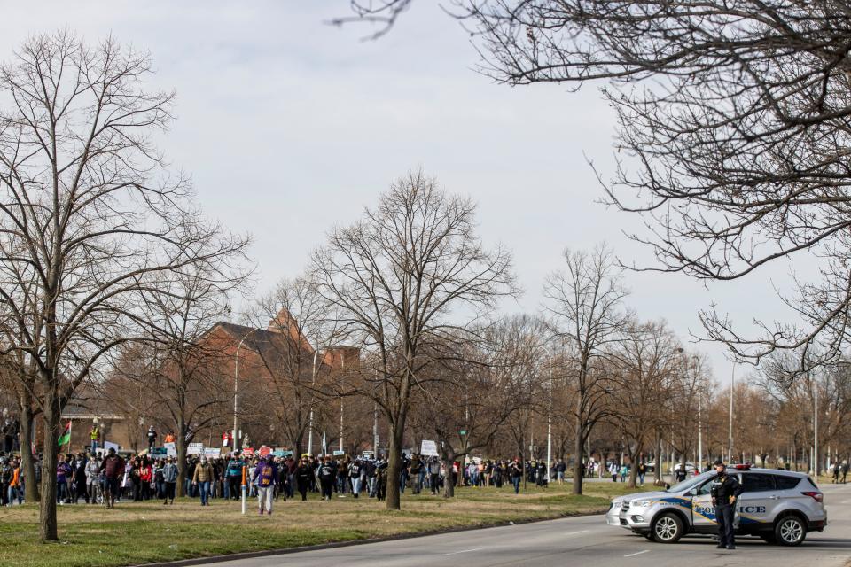 Marchers make their way south on Roy Wilkins during a protest in Louisville Saturday on the anniversary of Breonna Taylor being killed in her apartment by LMPD officers. March 13, 2021