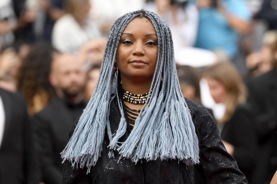 Member of the Jury director Rungano Nyoni has gone for a bold blue with her hair. (Getty Images)