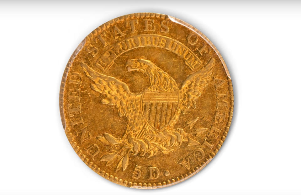 This image taken from video provided by Stack's Bowers Galleries shows the back of a 1822 Half Eagle $5 piece gold coin from the D. Brent Pogue Collection that was sold at Stack's Bowers Galleries in Las Vegas. The coin trading world has a new gold standard, after the only known 1822 half eagle $5 piece in private hands sold at auction in Las Vegas for $8.4 million, experts said Friday, March 26, 2021. (Stack's Bowers Galleries via AP)